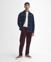 Load image into Gallery viewer, Model wearing Barbour Southfield Tailored Checked Cord Shirt in Inky Blue.
