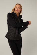 Load image into Gallery viewer, Model wearing Alp N Rock - Meadow Hybrid Hoodie Jacket in Black.
