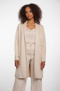 Model wearing Rino & Pelle - Mirola Duster in Birch Gold .