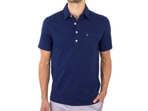 Model wearing  Criquet - Top-Shelf Players Polo in Navy.