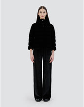 Load image into Gallery viewer, Model wearing Herno Women&#39;s Marbled Velvet Jacket w/ 3/4 Sleeves &amp; Knit Gloves in Black.
