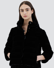 Load image into Gallery viewer, Model wearing Herno Women&#39;s Marbled Velvet Jacket w/ 3/4 Sleeves &amp; Knit Gloves in Black.
