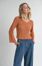 Load image into Gallery viewer, Model wearing Sadie &amp; Sage Perfect Flow Pointelle Knit Sweater in Pumpkin.
