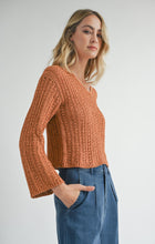 Load image into Gallery viewer, Model wearing Sadie &amp; Sage Perfect Flow Pointelle Knit Sweater in Pumpkin.
