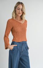 Load image into Gallery viewer, Model wearing Sadie &amp; Sage Perfect Flow Pointelle Knit Sweater in Pumpkin.
