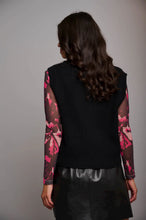 Load image into Gallery viewer, Model wearing Rino &amp; Pelle - Unna V-Neck Sweater Vest in Black - back.
