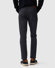 Load image into Gallery viewer, Model wearing Rodd &amp; Gunn - Motion Melange Straight Fit Jean in Navy - back.
