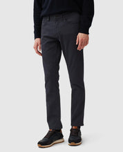 Load image into Gallery viewer, Model wearing Rodd &amp; Gunn - Motion Melange Straight Fit Jean in Navy.
