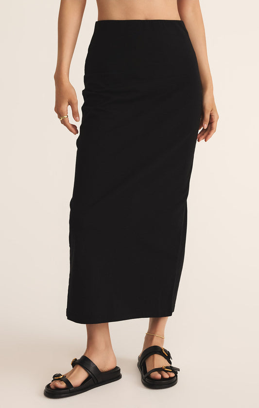 Model wearing ZSupply - Gail Midi Skirt in True Black.