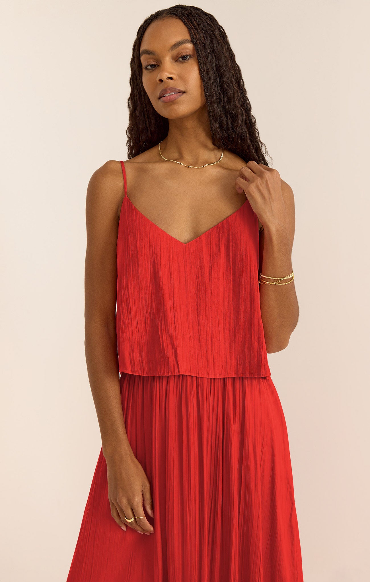 Model wearing ZSupply - Fiore Crinkle Satin Tank in Cabana Red.