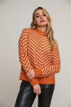 Load image into Gallery viewer, Model wearing Rino &amp; Pelle - Annelie Mock Neck Sweater in Clay Birch.
