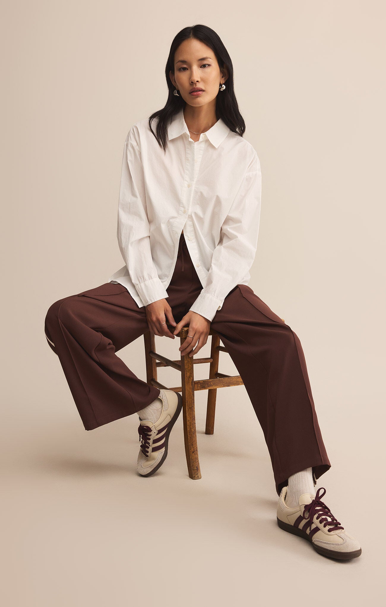 Model wearing ZSupply Saunder Track Pant in Sandalwood.