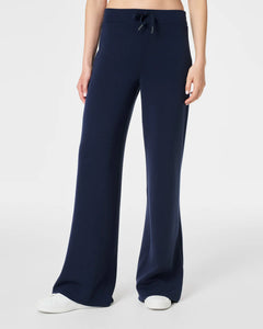 Model Wearing Spanx - Air Essentials Wide Leg Pant - Timeless Navy.