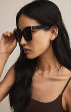 Load image into Gallery viewer, Model wearing ZSupply Confidential Sunglasses in Polished Black - Brown Polarized. 
