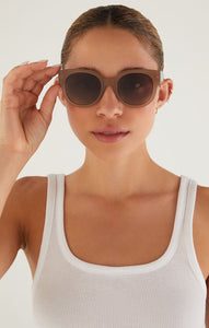 Model wearing ZSupply Lunch Date Sunglasses in Taupe - Gradient Polarized.