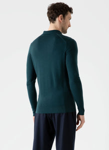 Model wearing Sunspel - Fine Merino Wool LS Polo Shirt in Peacock - back.