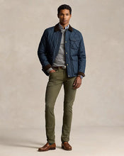 Load image into Gallery viewer, Model wearing POLO Ralph Lauren - Sullivan Slim Jean - Stretch in Dark Loden.
