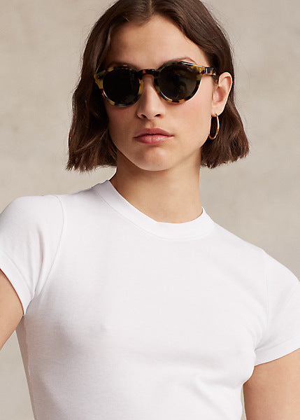 Model wearing Polo Ralph Lauren - Ribbed Cotton Tee in White..
