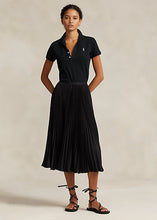 Load image into Gallery viewer, Model wearing Polo Ralph Lauren - Pleated Georgette Skirt in Black.
