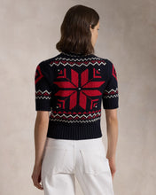 Load image into Gallery viewer, Model wearing Polo Ralph Lauren - Snowflake-Motif S/S Sweater in Navy/Red Multi - back.
