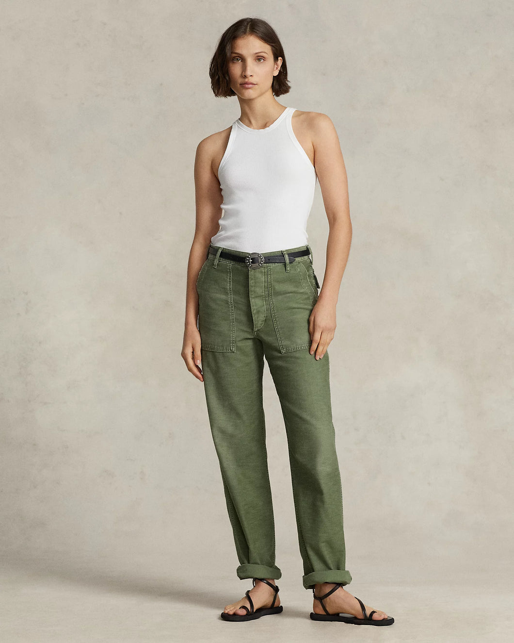 Model wearing Polo Ralph Lauren - The Ricky Pant in Olive.