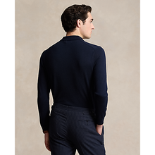 Load image into Gallery viewer, Model wearing POLO Ralph Lauren - LS Merino Wool Button Placket Polo Sweater in Hunter Blue - back.
