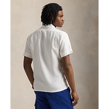 Load image into Gallery viewer, Model wearing  POLO Ralph Lauren - SS Garment Dyed Slubby Linen Andy Camp Shirt in Ceramic White - back.
