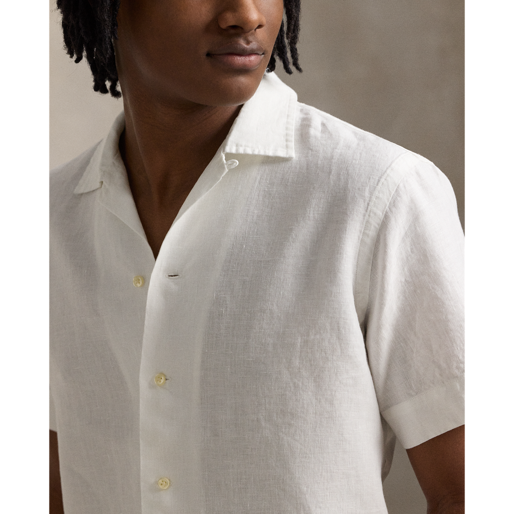 Model wearing  POLO Ralph Lauren - SS Garment Dyed Slubby Linen Andy Camp Shirt in Ceramic White.