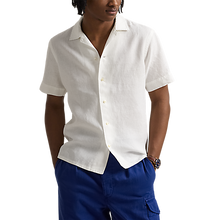 Load image into Gallery viewer, Model wearing  POLO Ralph Lauren - SS Garment Dyed Slubby Linen Andy Camp Shirt in Ceramic White.
