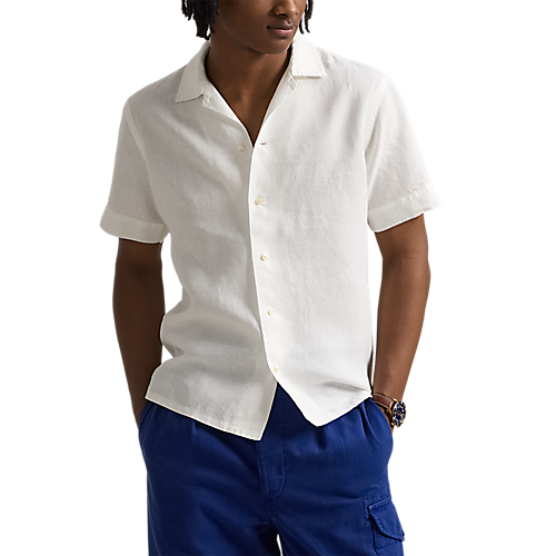 Model wearing  POLO Ralph Lauren - SS Garment Dyed Slubby Linen Andy Camp Shirt in Ceramic White.