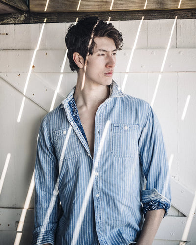 Model wearing RRL - Indigo Striped Double-Faced Workshirt in Indigo.