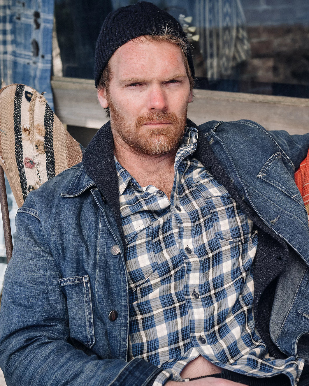 Model wearing RRL - Plaid Double-Faced Workshirt in Blue Multi.