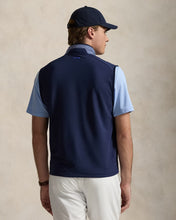 Load image into Gallery viewer, Model wearing RLX - Ralph Lauren Hybrid Full Zip Vest in Blue Multi - back.
