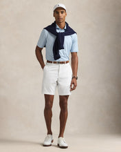 Load image into Gallery viewer, Model wearing RLX - Ralph Lauren 9-Inch Tailored Fit Performance Short in Ceramic White.
