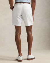 Load image into Gallery viewer, Model wearing RLX - Ralph Lauren 9-Inch Tailored Fit Performance Short in Ceramic White - back.
