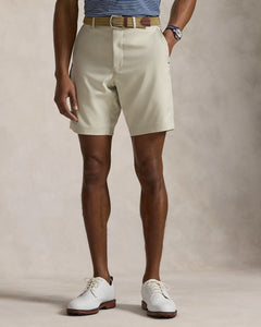 Model wearing RLX - Ralph Lauren 9-Inch Tailored Fit Performance Short in Basic Sand.