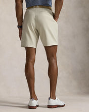 Load image into Gallery viewer, Model wearing RLX - Ralph Lauren 9-Inch Tailored Fit Performance Short in Basic Sand - back.
