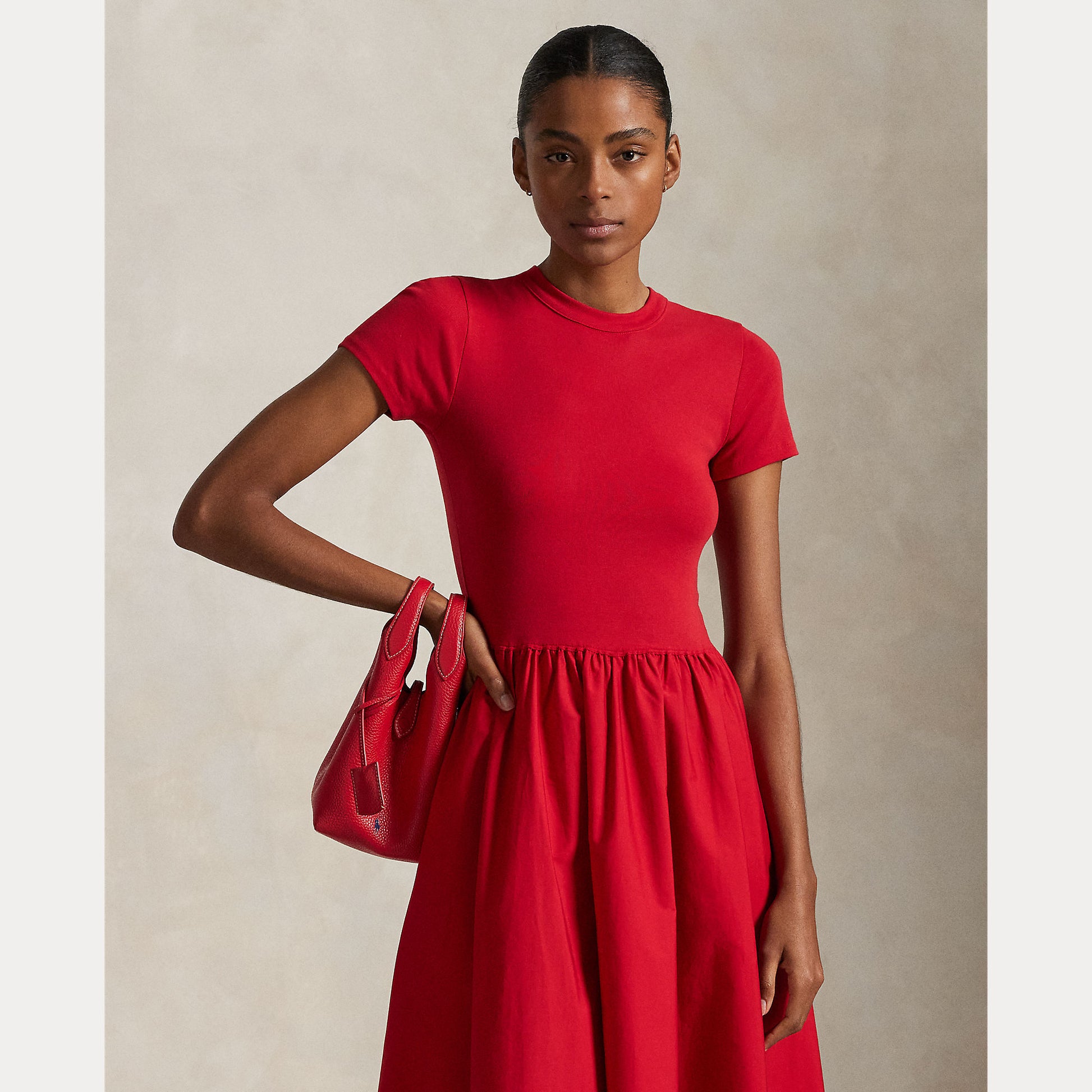 Model wearing Polo Ralph Lauren - Crewneck SS A-Line Dress in Red.