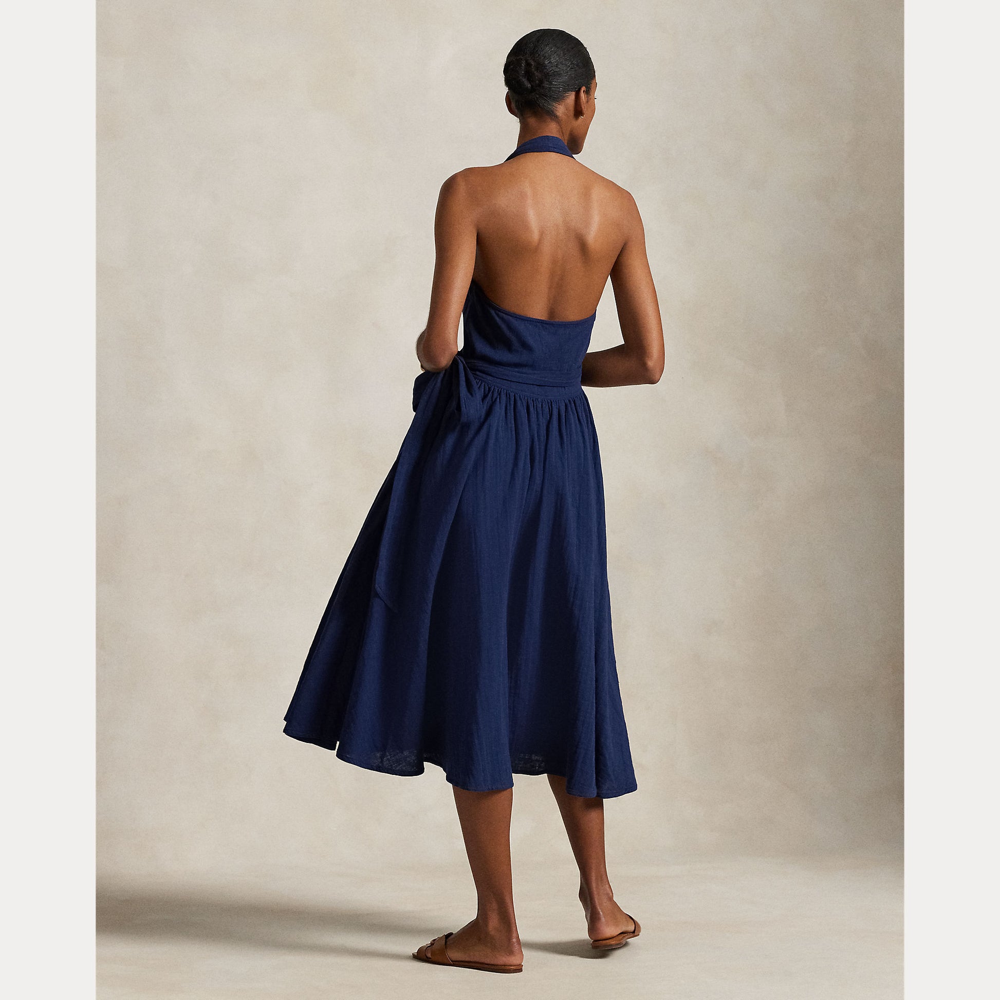 Model wearing Polo Ralph Lauren - Halter Sleeveless A-Line Dress in Newport Navy - back.