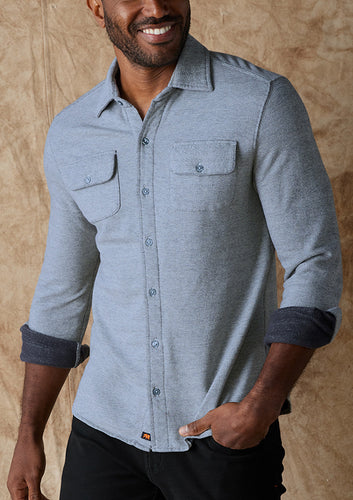 Model wearing The Normal Brand - Textured Knit Everyday Shirt in Vintage Blue.