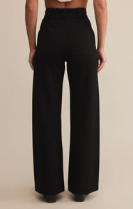 Model wearing ZSupply Do It All Rilynn Pant in Black - back.