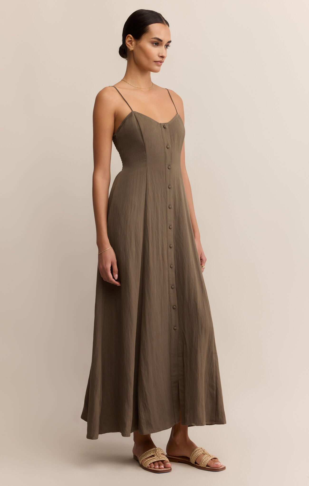 Model wearing ZSupply Angel Eyes Midi Dress in Tiki.