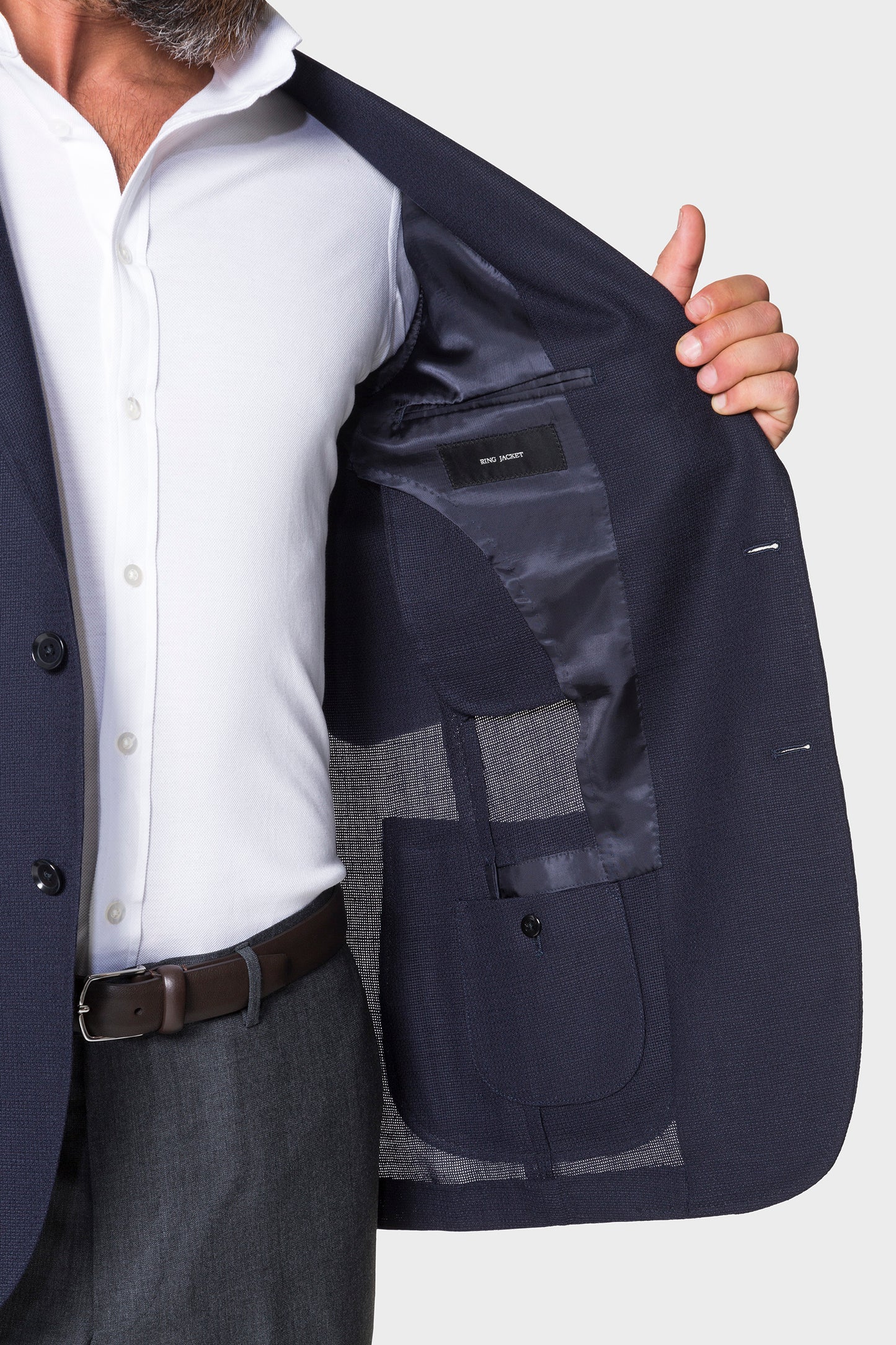 Model wearing Ring Jacket Signature Navy Balloon Jacket.