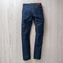 Load image into Gallery viewer, Raleigh Denim Martin thin taper resin rinse jeans back view..
