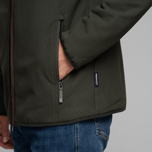 Model wearing Schoffel Men's Burrough Jacket in Forest side pocket. 