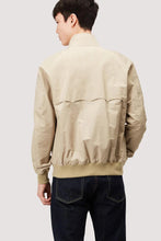Load image into Gallery viewer, Model wearing Baracuta - G9 Harrington Jacket in Natural - back.
