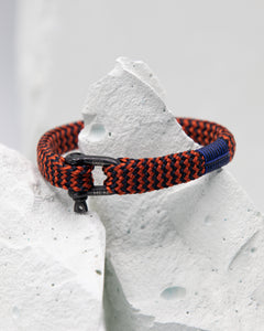 Pig & Hen Sharp Simon bracelet in coral, red and navy with black buckle.