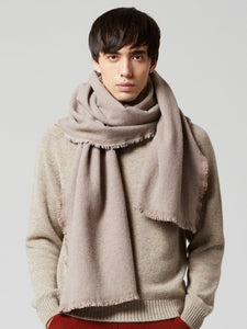 Model wearing Begg & Co - Washed River Eco Twill Merino Cashmere Scarf in Dark Natural.