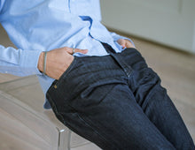Load image into Gallery viewer, Model wearing Raleigh Denim Jones Resin Rinse jeans.
