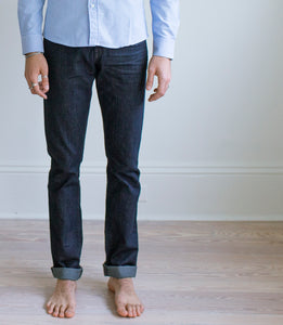Model wearing Raleigh Denim Jones Resin Rinse jeans.